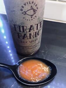 Devilfish Kitchen Pirate Panic Hot Sauce on spoon