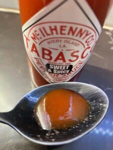 Tabasco Sweet and Spicy Sauce on a spoon
