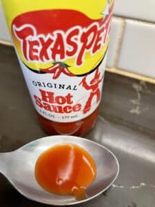 Texas-Petes-Original-Hot-Sauce-on-a-spoon