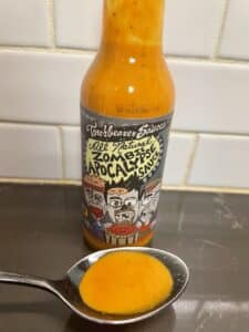 Zombie Apocalypse Hot Sauce on a spoon