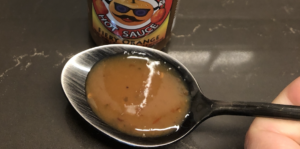Fire Fruits Hot Sauce - Fiery Orange in spoon